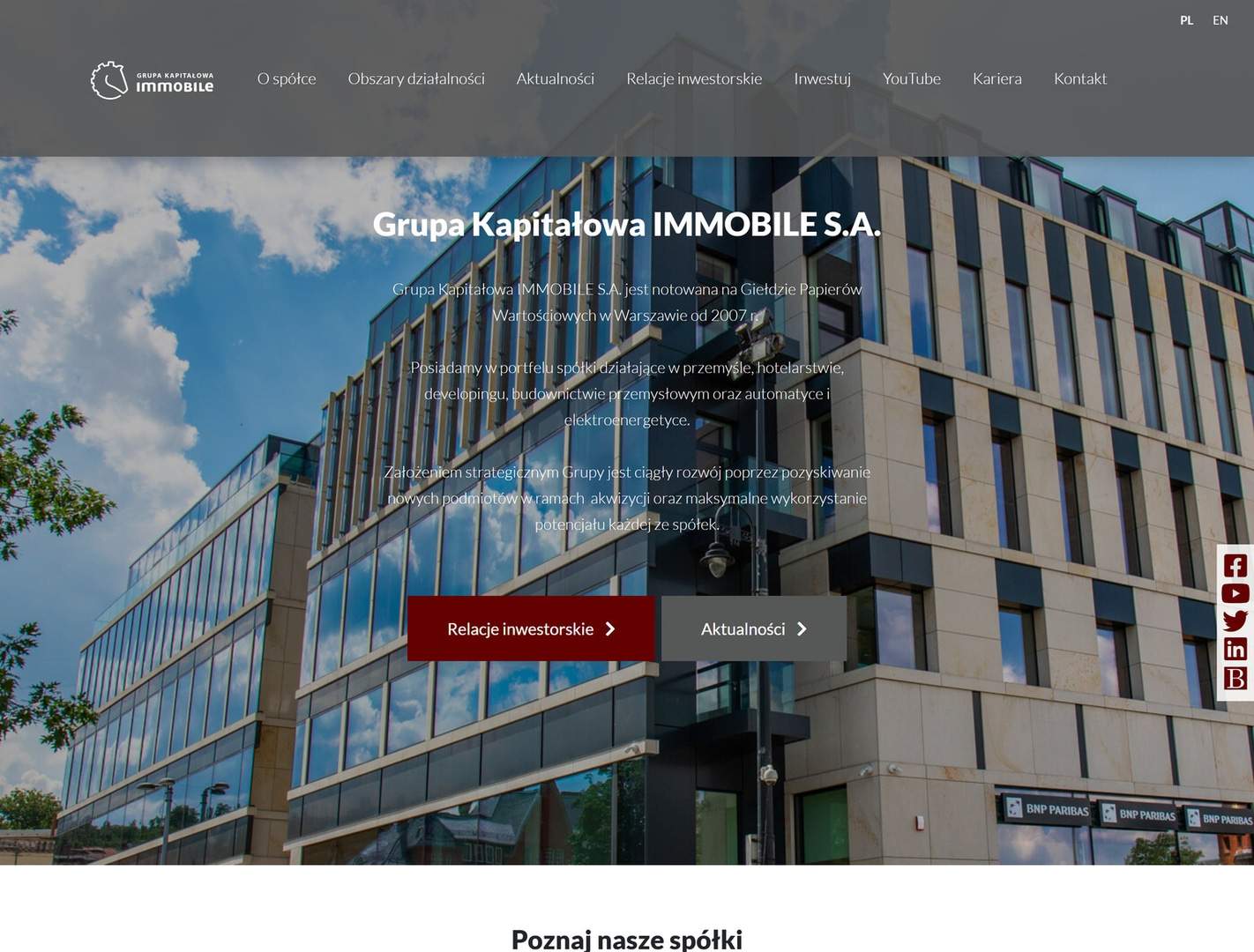 Strona główna serwisu Grupy Kapitałowej IMMOBILE w widoku desktop – szare hero z logotypem Immobile, nawigacją korporacyjną, nagłówkiem „Grupa Kapitałowa IMMOBILE S.A.” oraz przyciskami do relacji inwestorskich i aktualności.